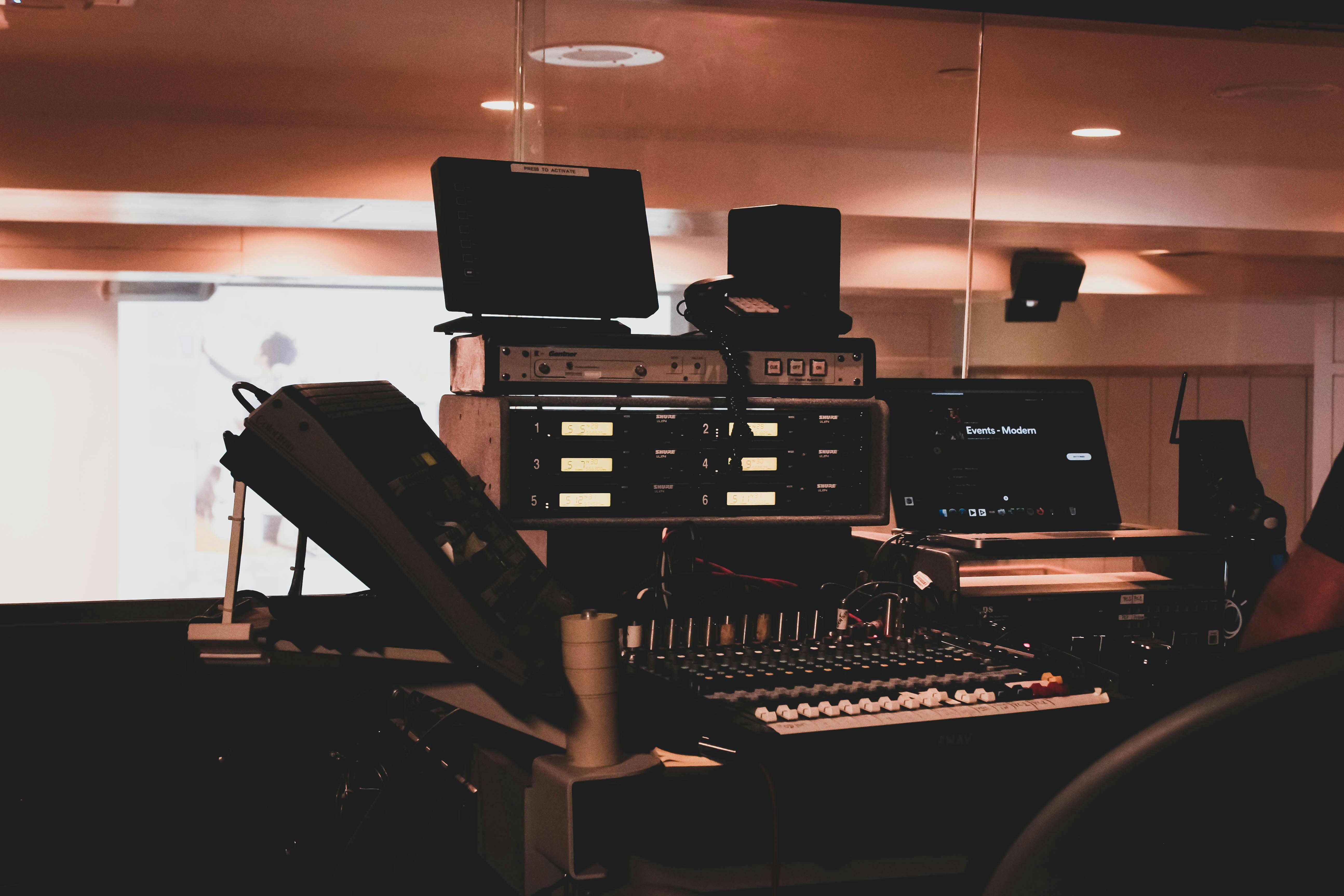 The sound board seen here combines multiple tracks to enable audio technicians to create the optimal soundscape for a space.