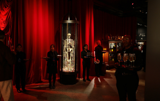 The entrance of the Johnny Depp with a skeleton display and employees